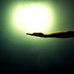 Hand with light above